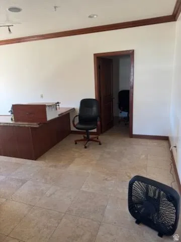 Office area with ornamental molding