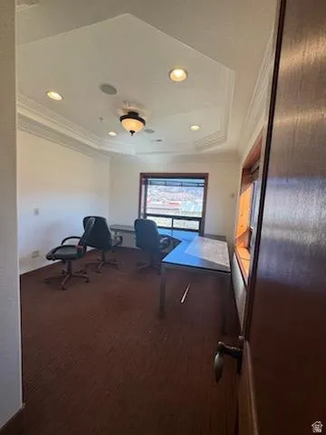 Office featuring ornamental molding and recessed lighting