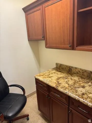 Laundry area featuring baseboards