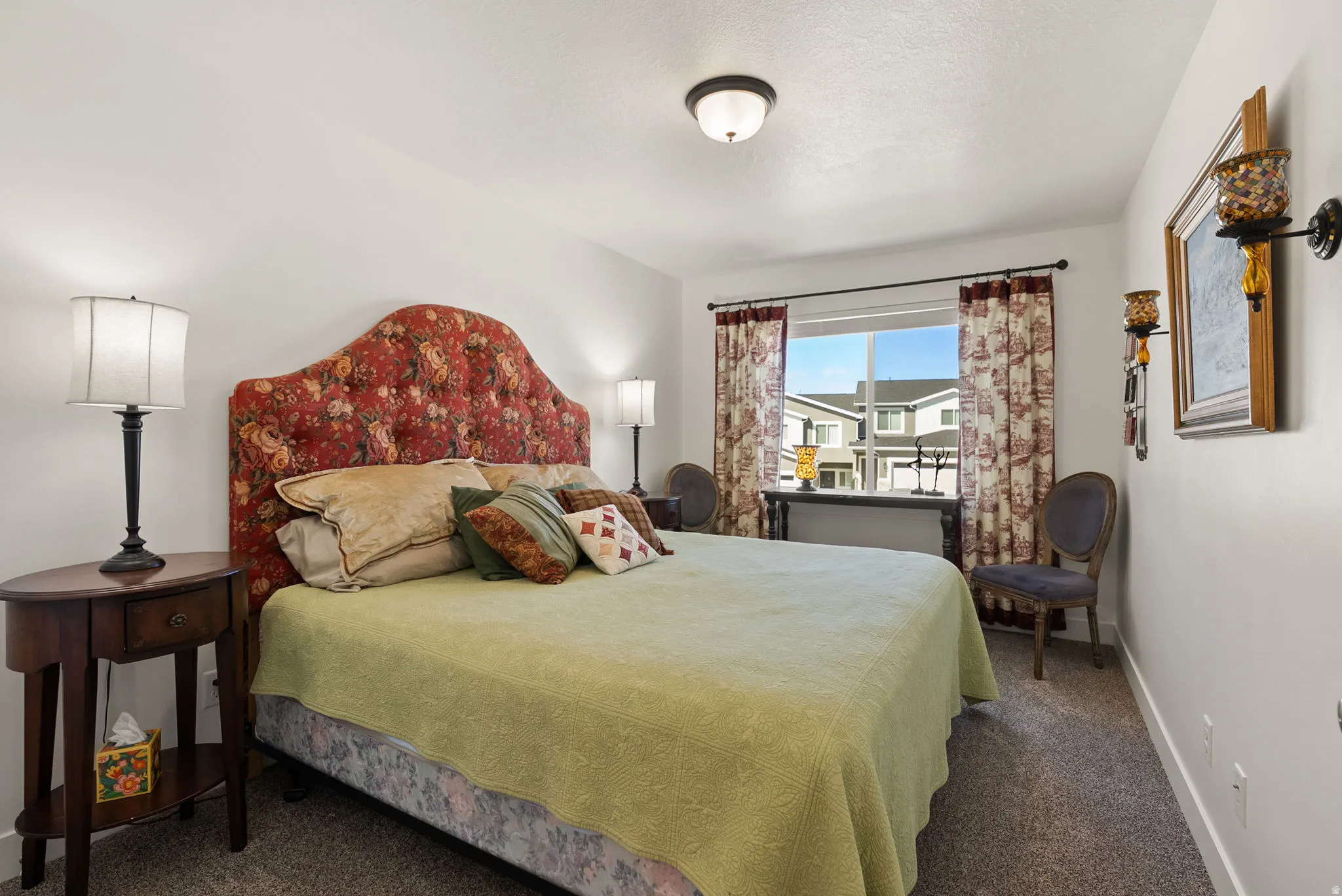 Bedroom with carpet floors and baseboards