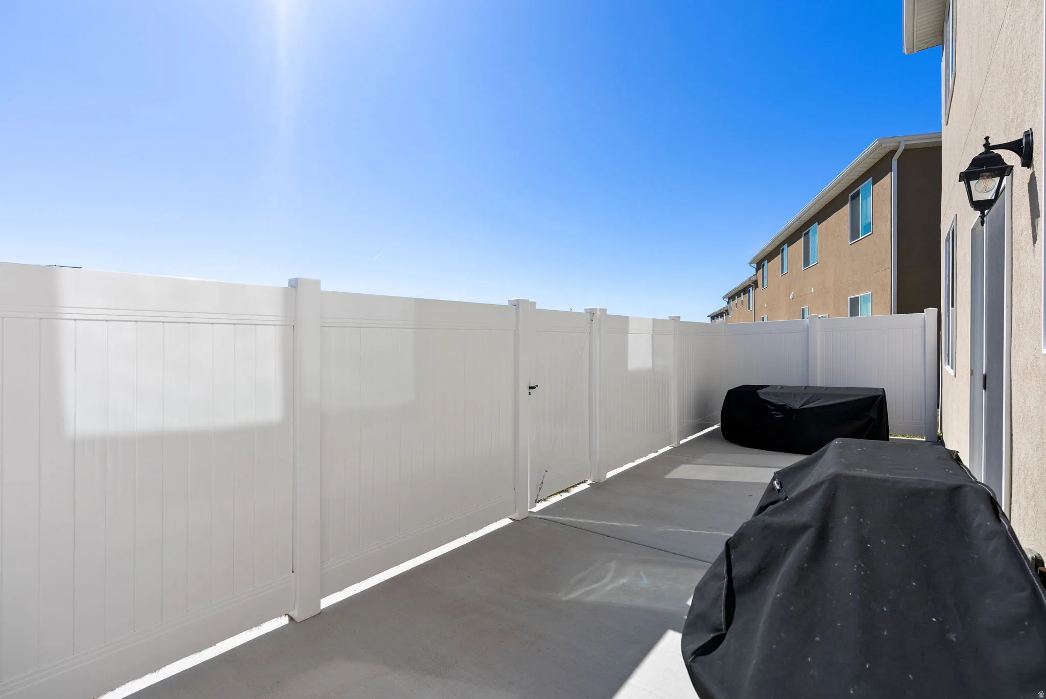 View of fenced backyard/patio