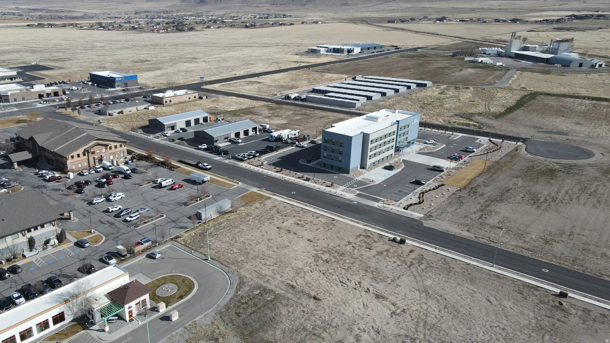 Aerial overview of property's location with industrial structures
