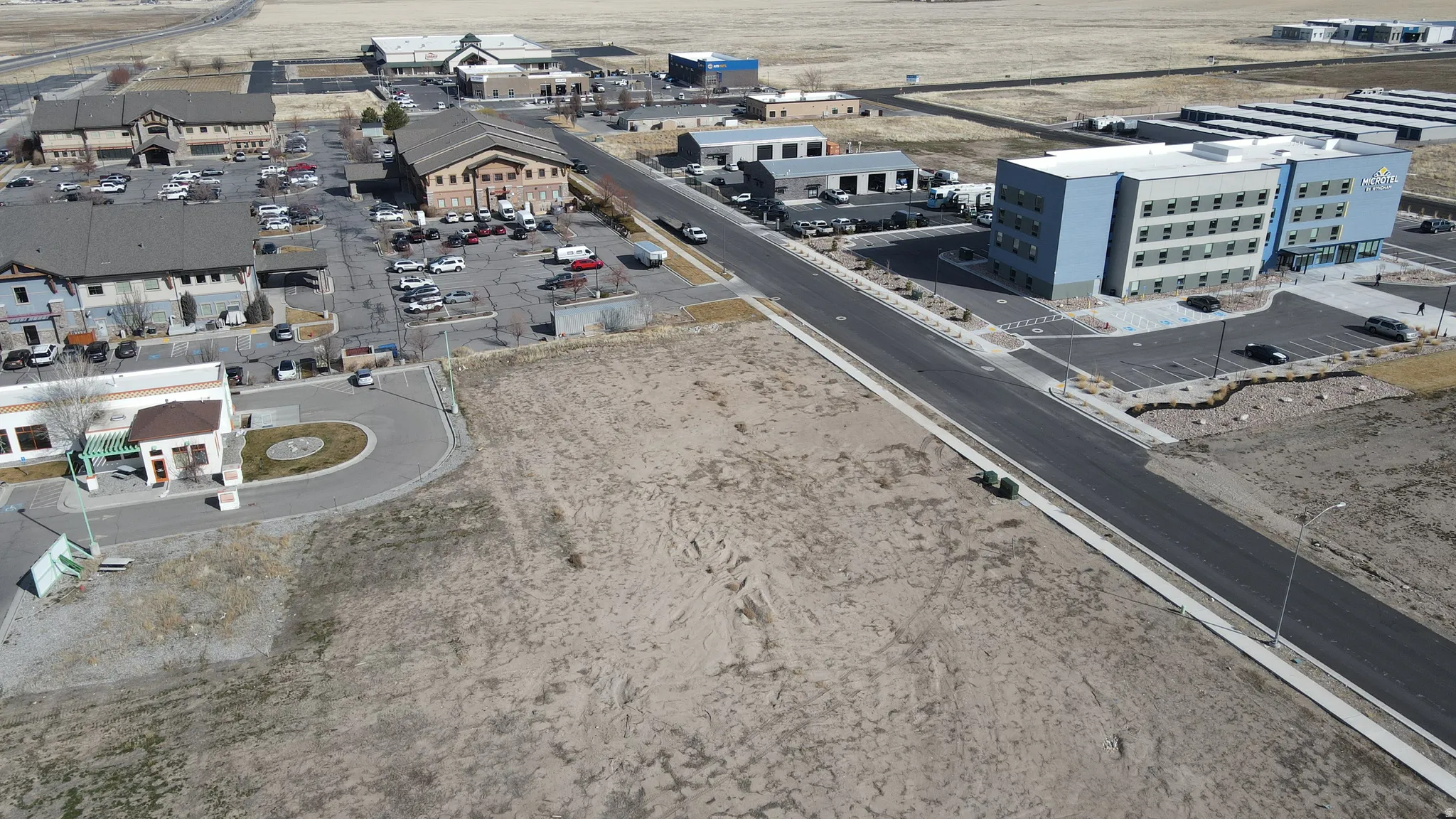 Aerial overview of property's location with industrial structures