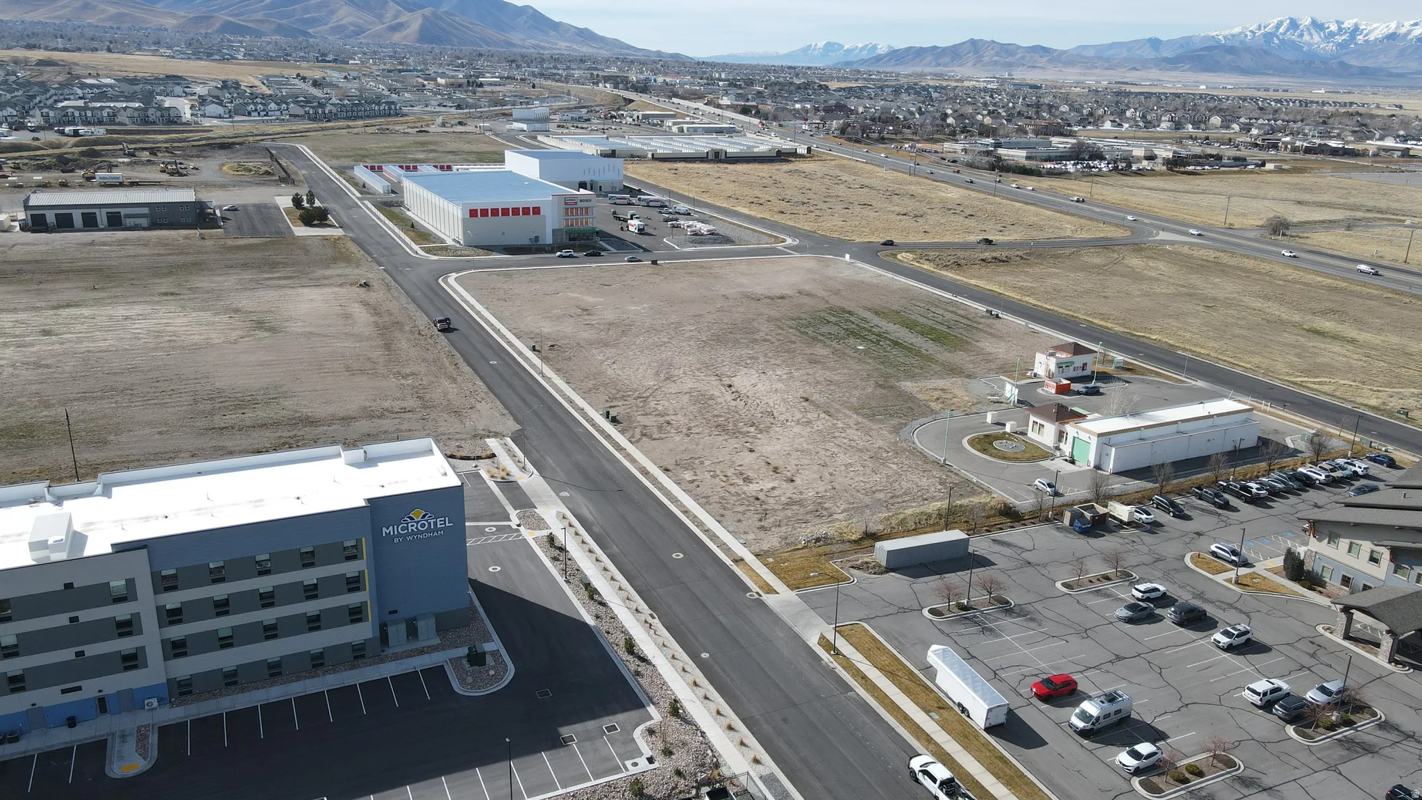 Aerial view of industrial structures and mountains