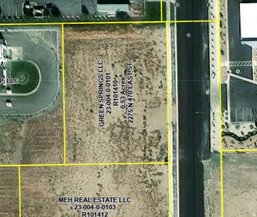 Aerial map of property and surrounding area featuring property parcel outlined