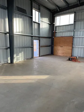 Garage with metal wall