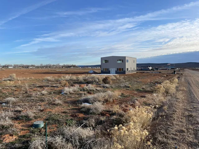 View of yard with a view of rural / pastoral area and an outdoor structure