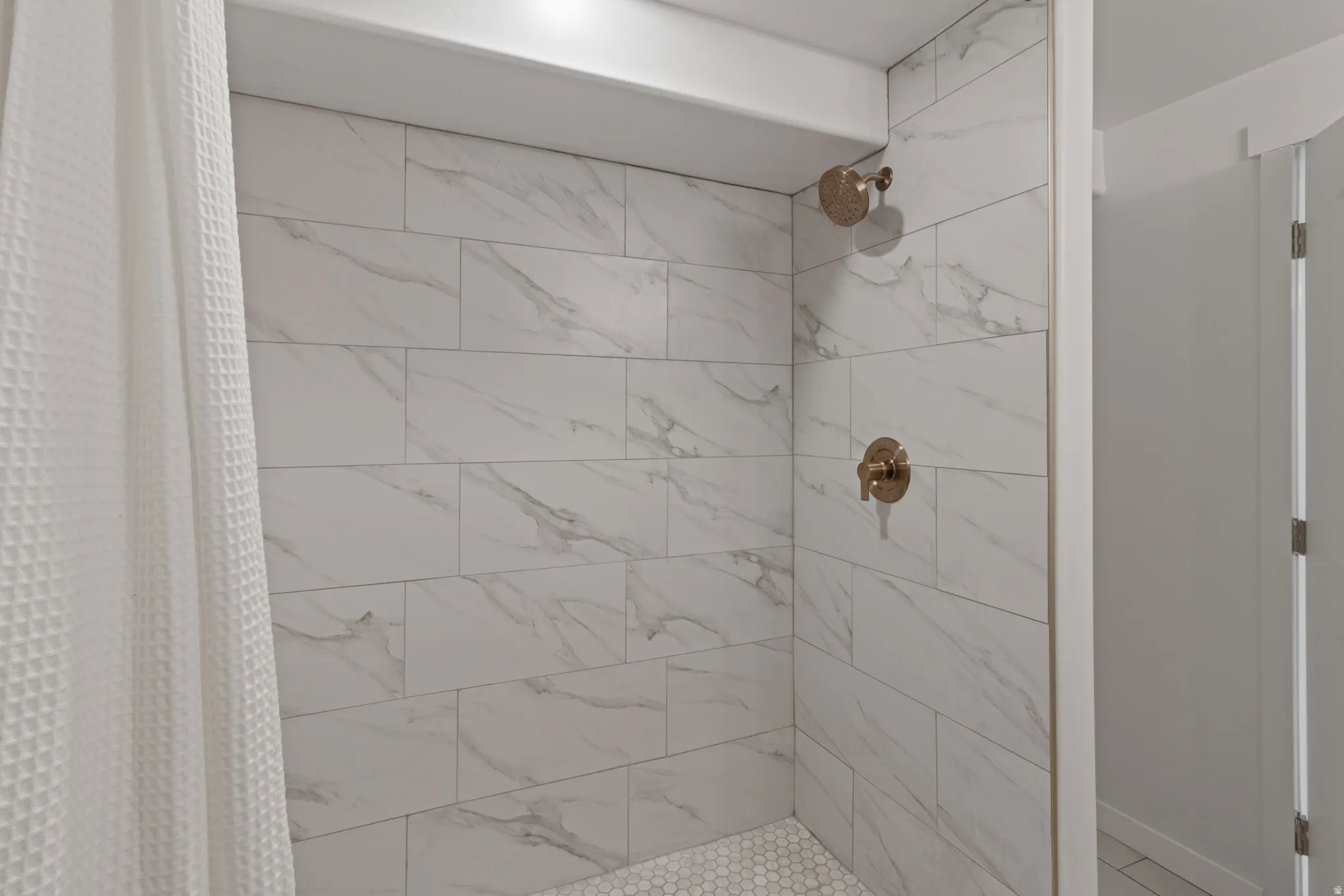 Full bath featuring a stall shower