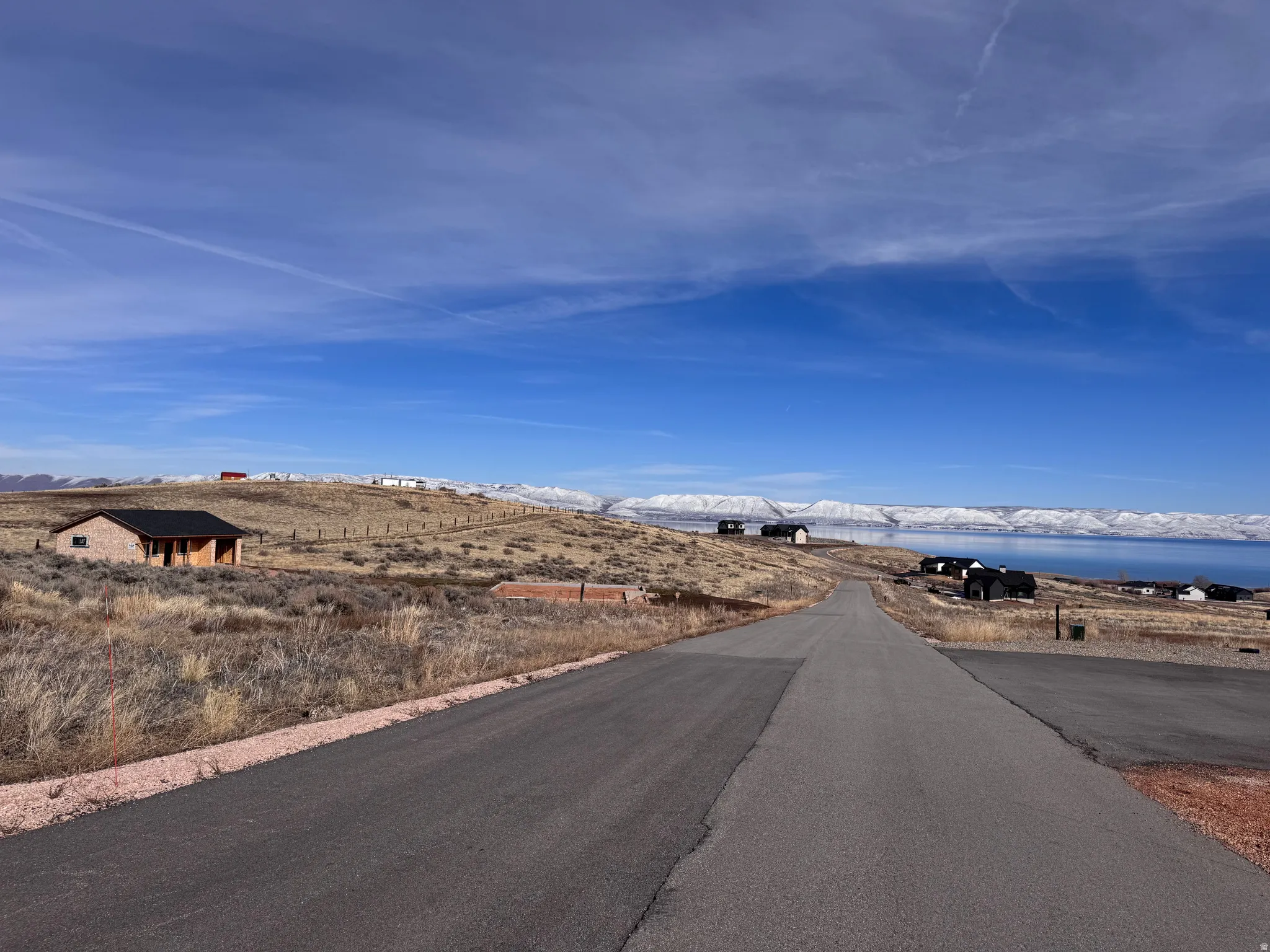 View of asphalt street with a mountain view