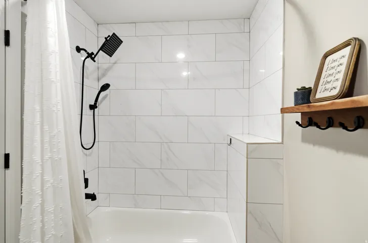 Full bathroom with shower / tub combo