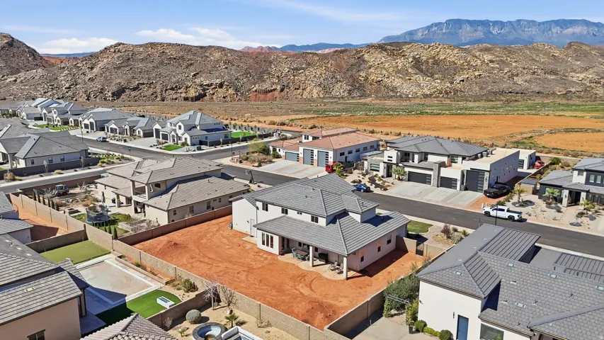 Aerial view of residential area with a mountain backdrop