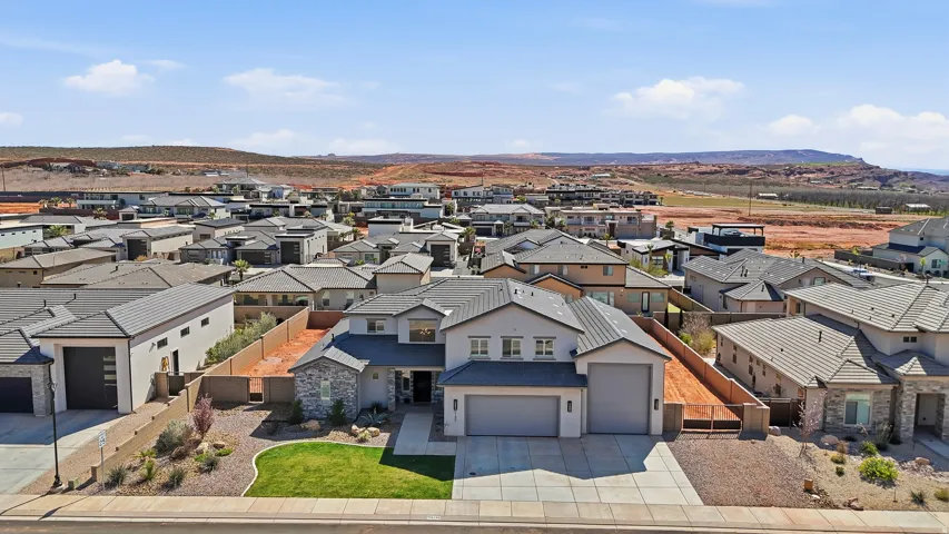 Aerial view of residential area with mountains