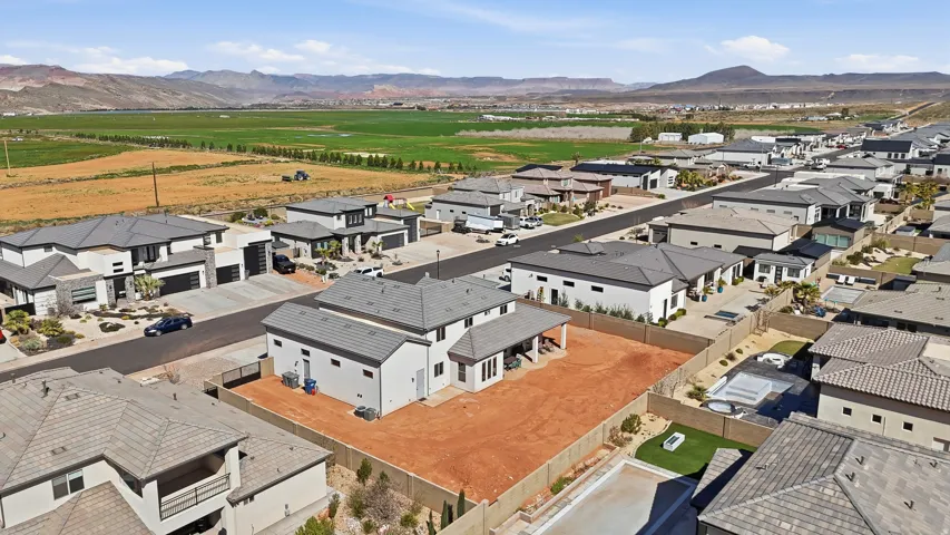Aerial view of residential area with a mountain backdrop