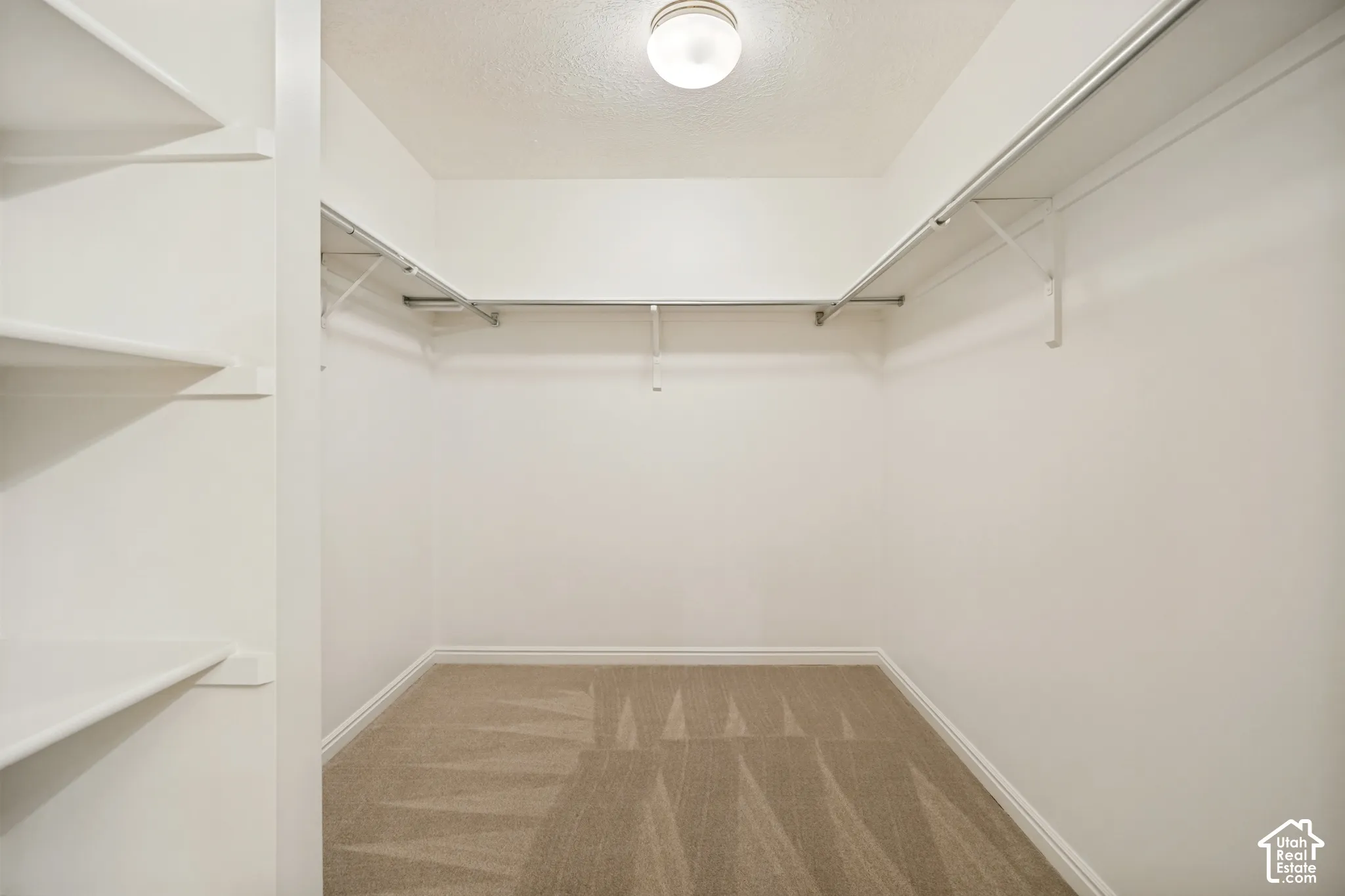 walk in closet in the primary bath