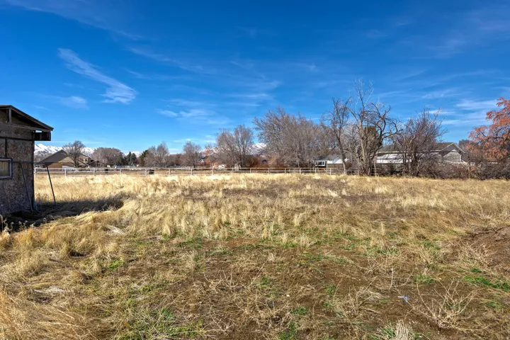 View of yard with a view of countryside