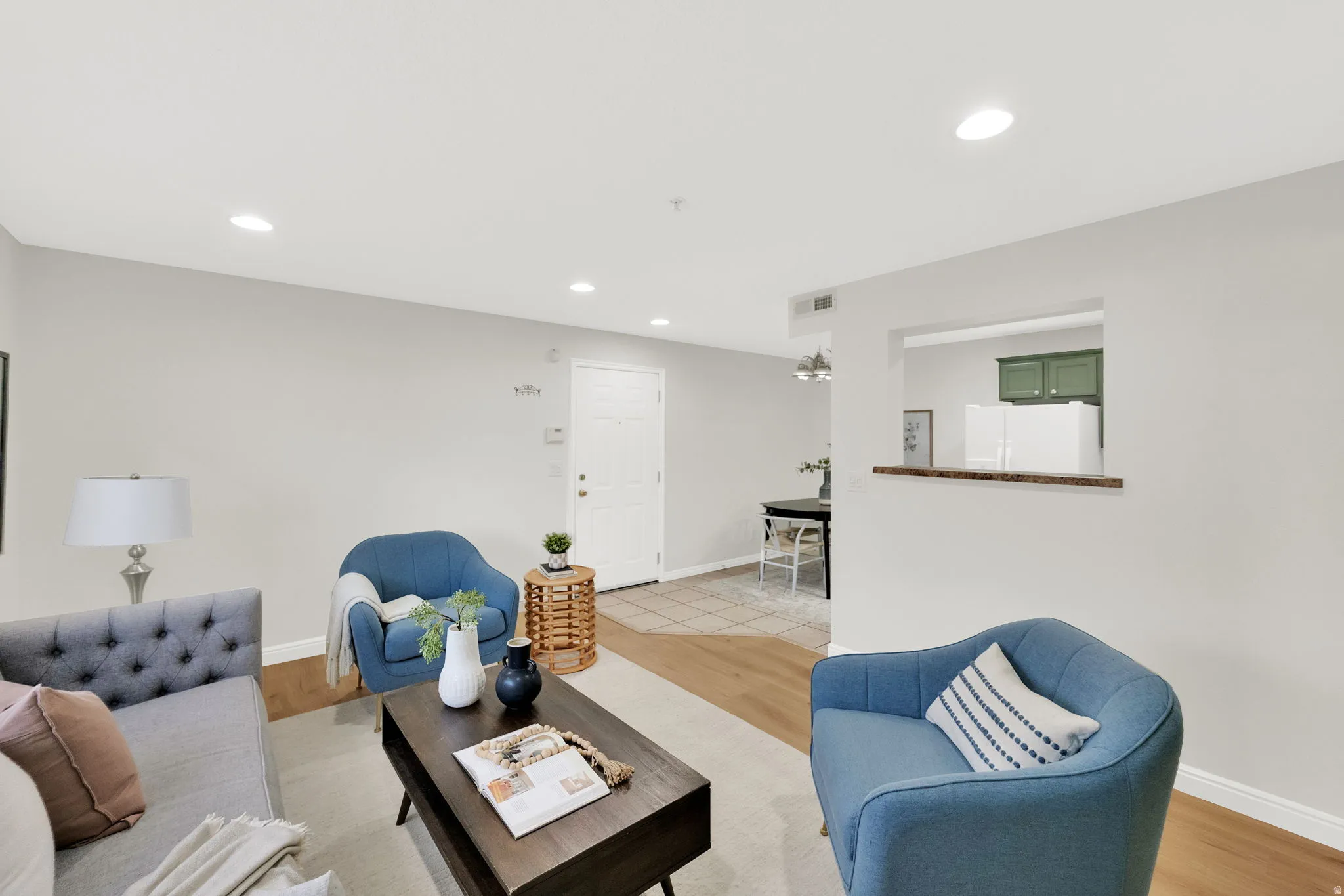 Living room featuring recessed lighting and light wood-style floors