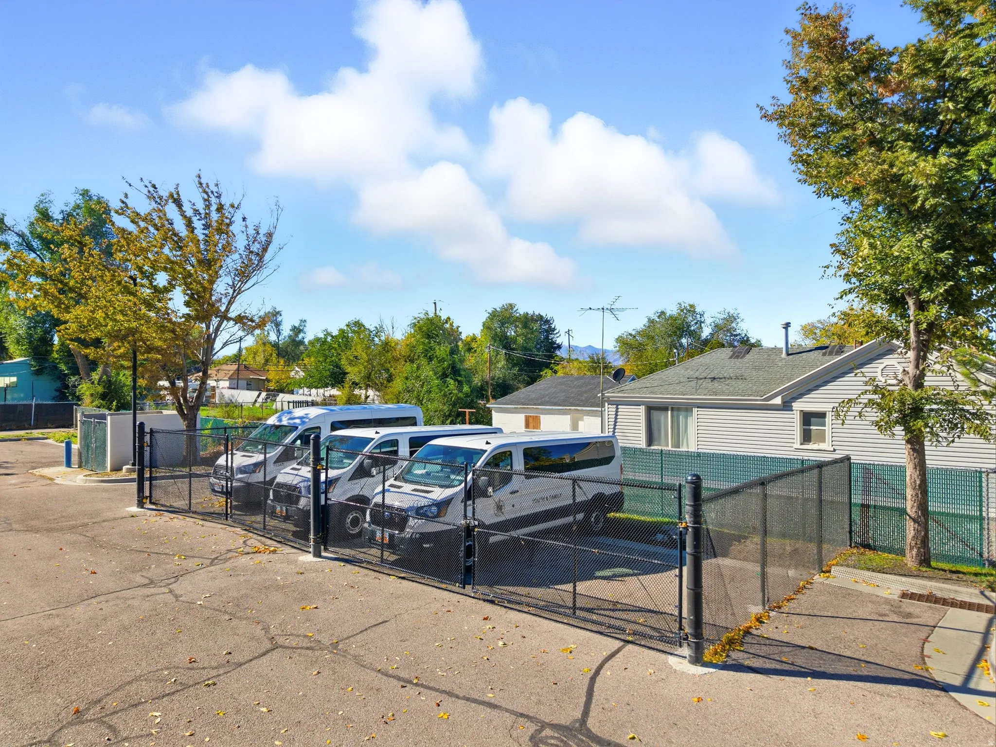 View of parking with a gate