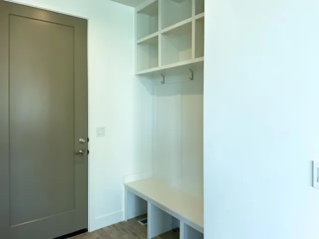 Mudroom featuring light wood-type flooring