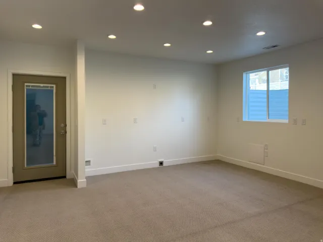 Basement entry and view of the area stubbed for a kitchen for Mother in Law or Possible ADU