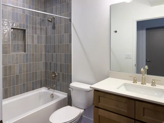 Full bathroom with vanity and shower / bath combination