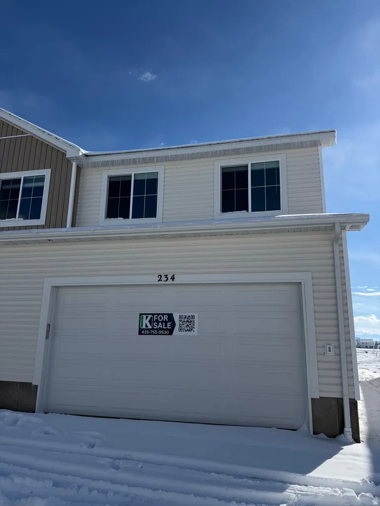 View of snow covered garage