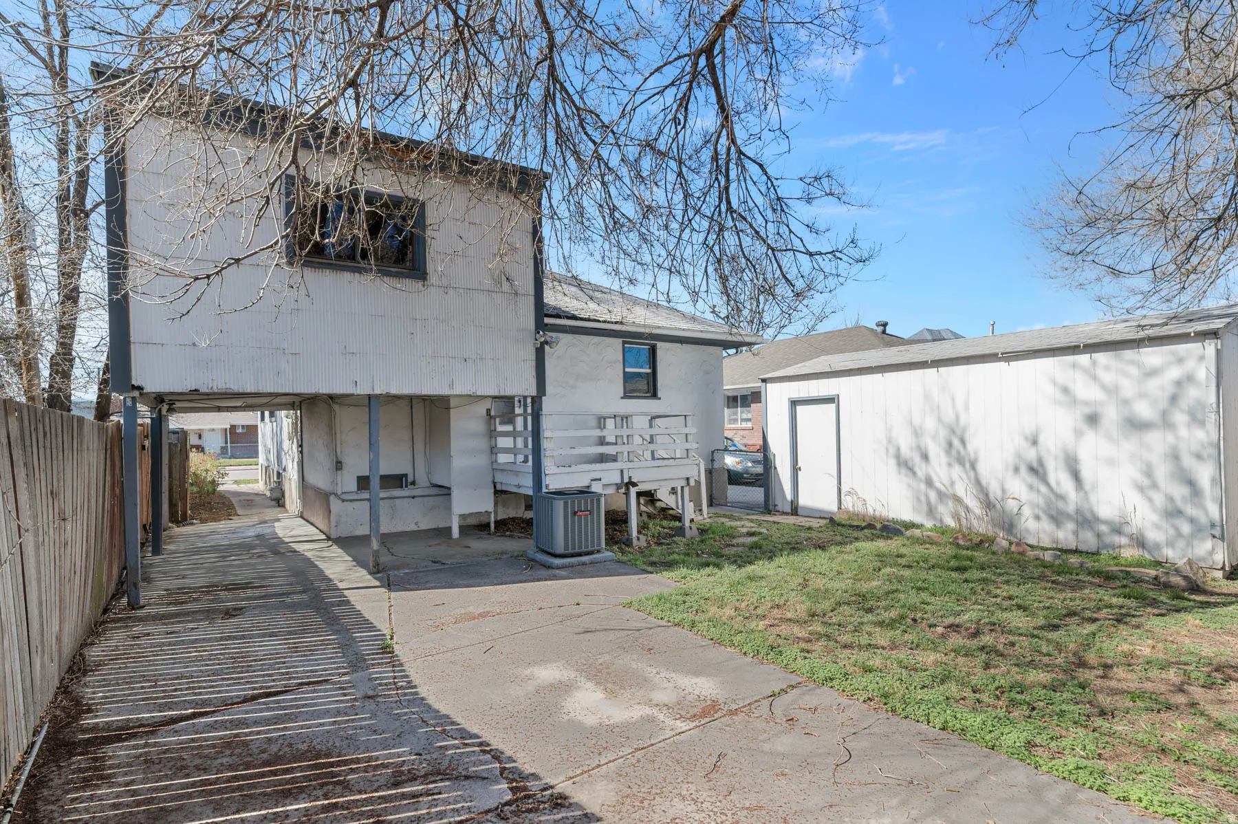 Back of home, deck, and garage
