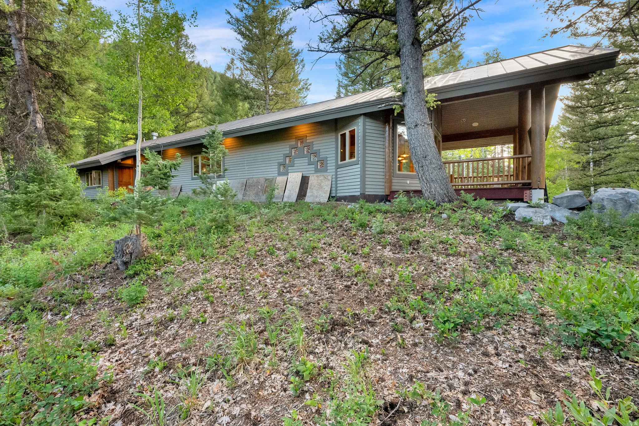 Modern architectural style Dance studio with climbing gym, sauna, and covered outdoor deck over looking river.