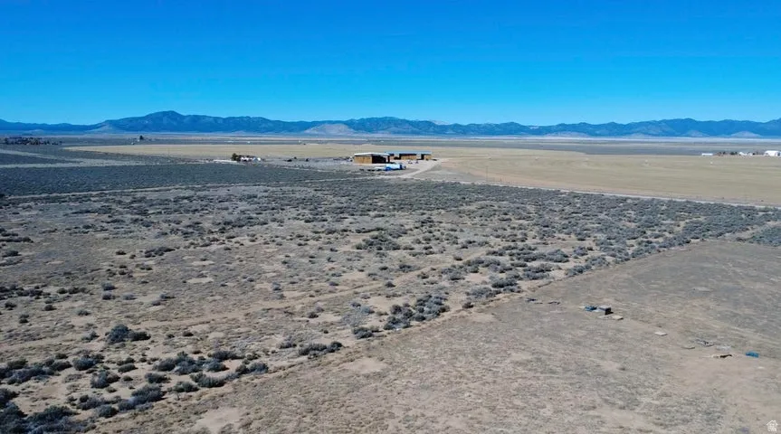 View of mountain backdrop featuring a desert landscape and rural landscape