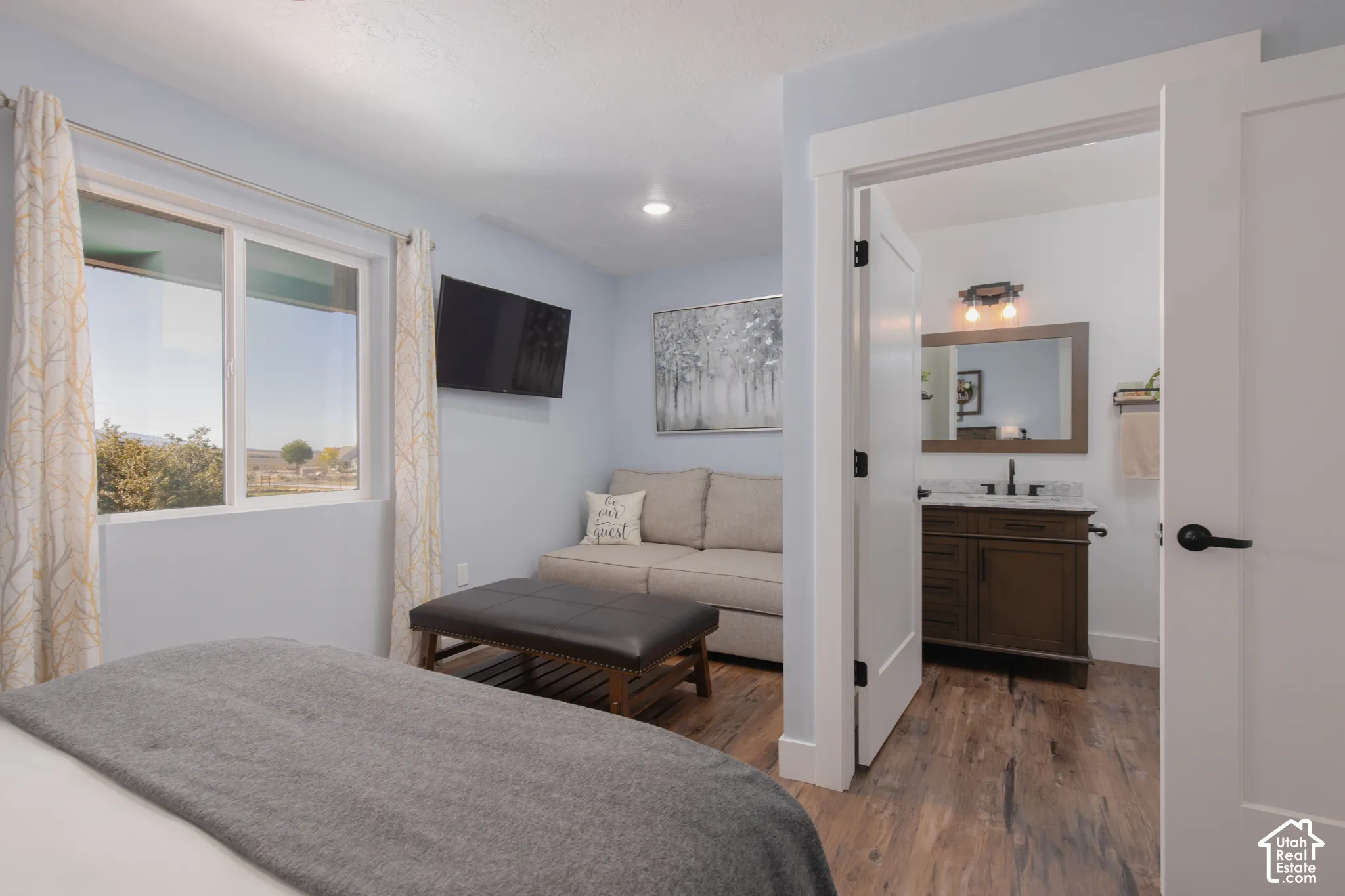 White-framed window and light blue walls