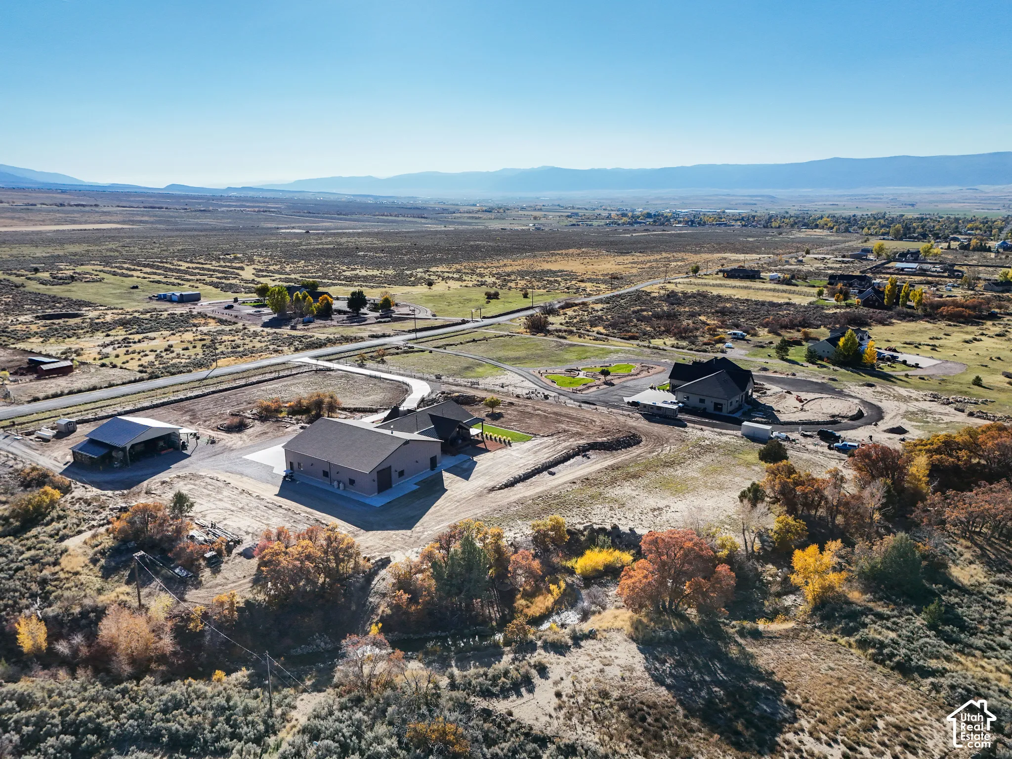 View of rural area featuring a mountainous background and a desert landscape