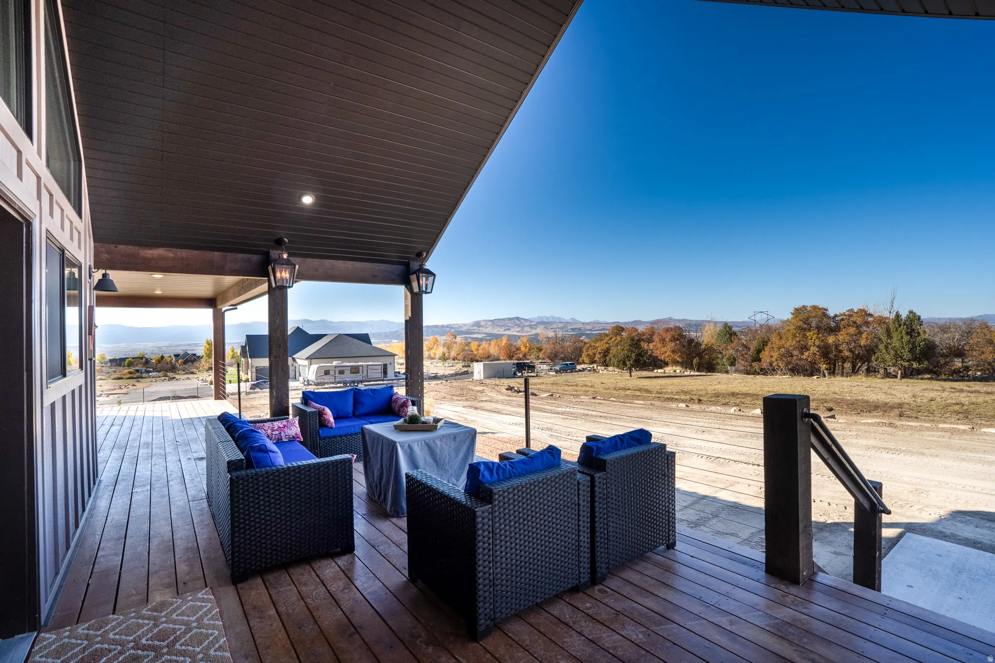 Deck featuring an outdoor lounge area and a mountain view