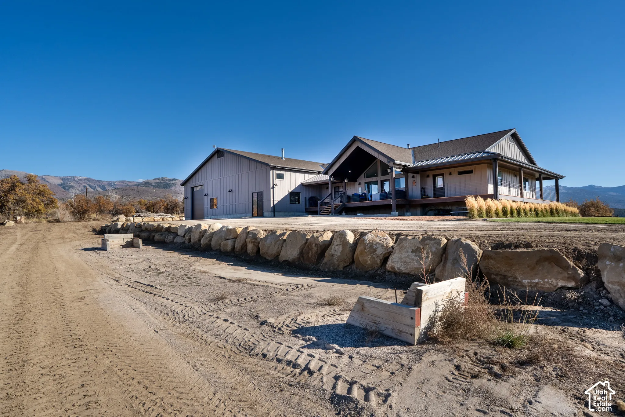 Back of house featuring wild land fire-rated exterior