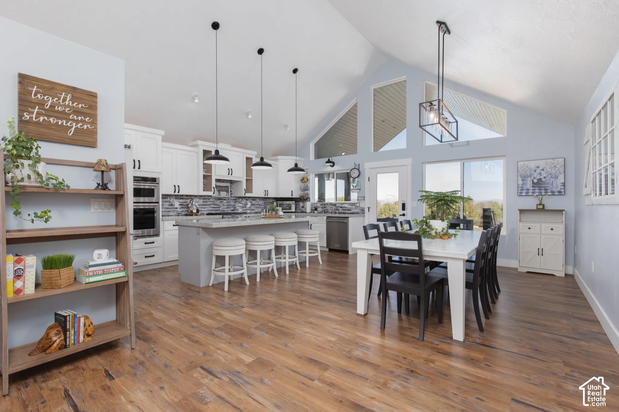 Vaulted ceilings with abundant natural light, north view of private backyard