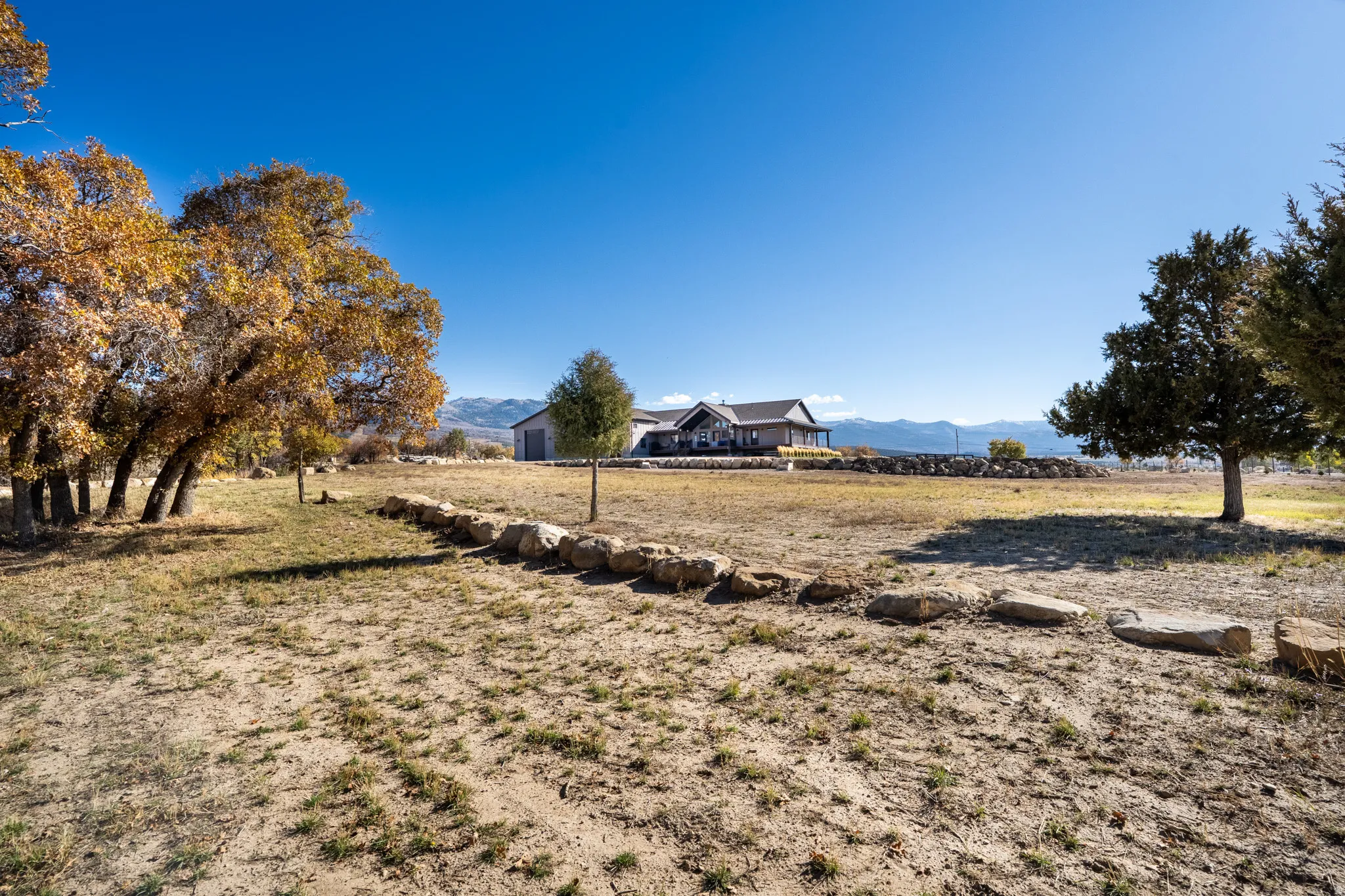 View of yard featuring a mountain view and a rural view