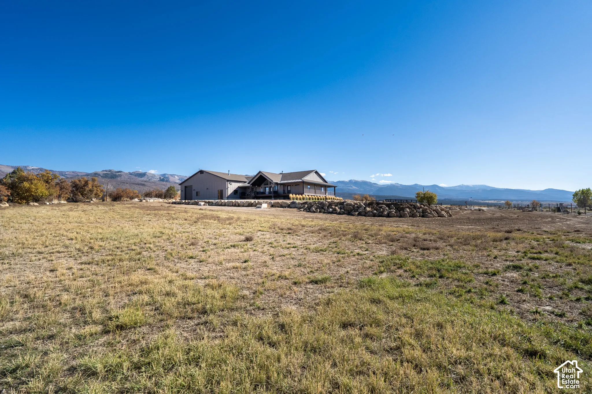 View of backyard near stream looking toward house