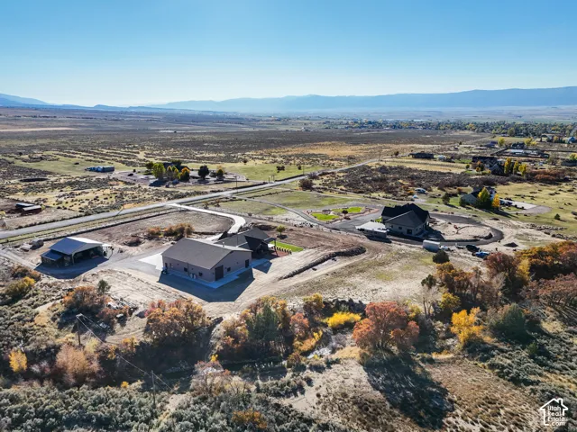 View of rural area featuring a mountainous background and a desert landscape