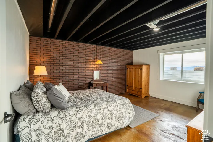 Bedroom 3 with ground level window for lots of natural light