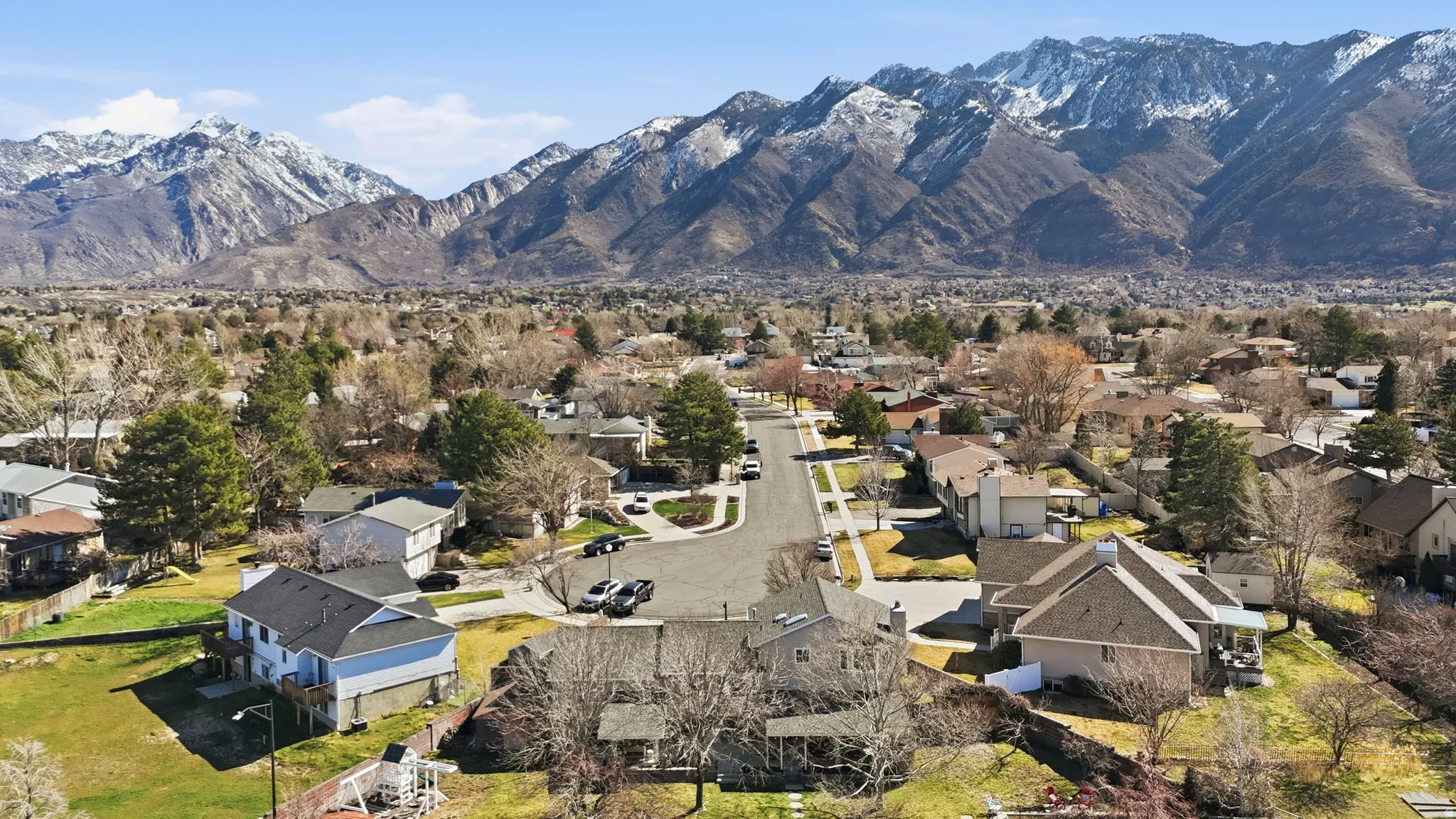 Aerial view of residential area with a mountain backdrop