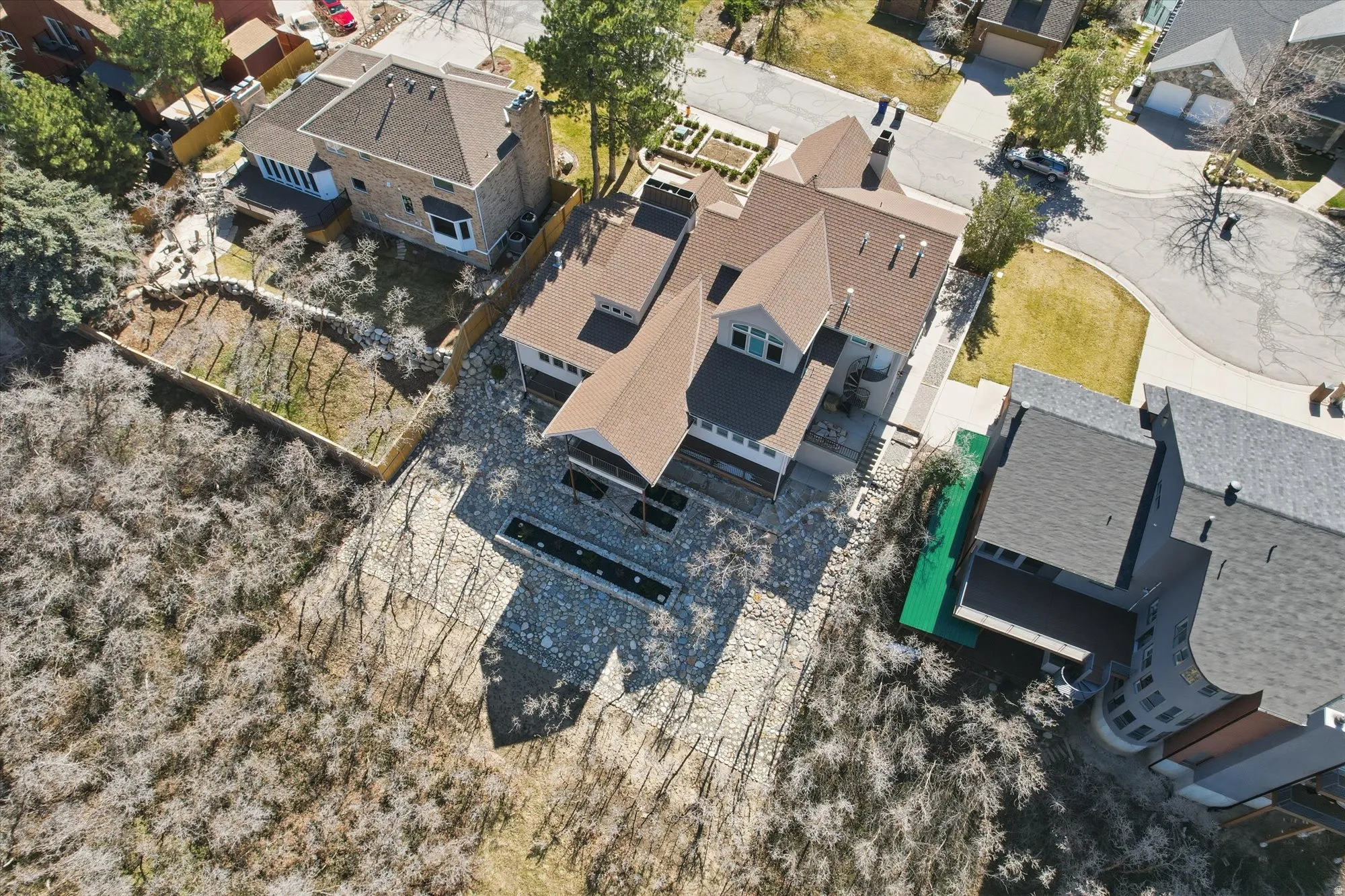 Aerial view of property's location with nearby suburban area