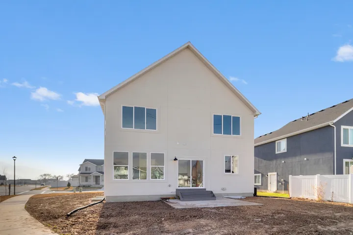 Rear view of property featuring a patio