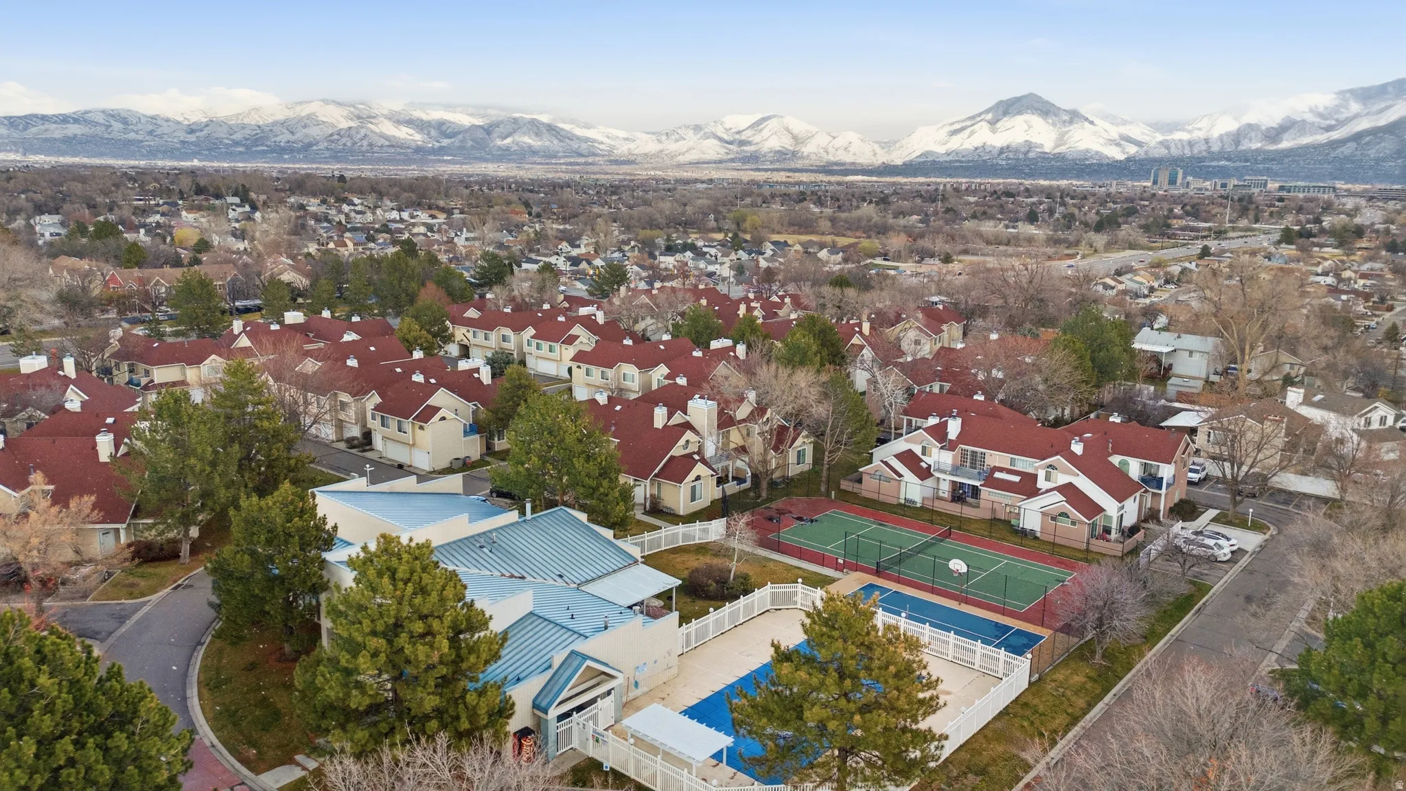 Aerial view of residential area with a mountain backdrop