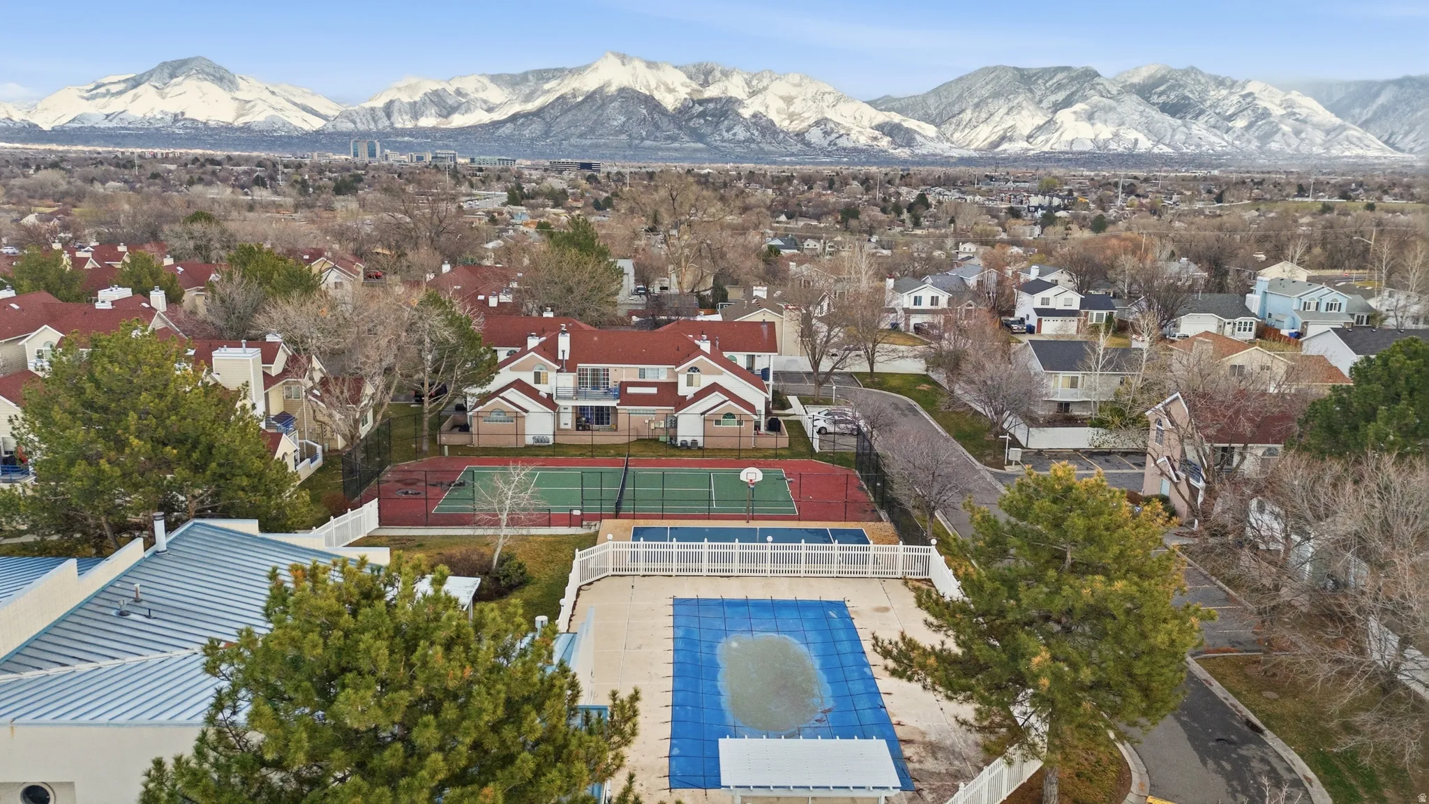 Aerial perspective of suburban area with mountains