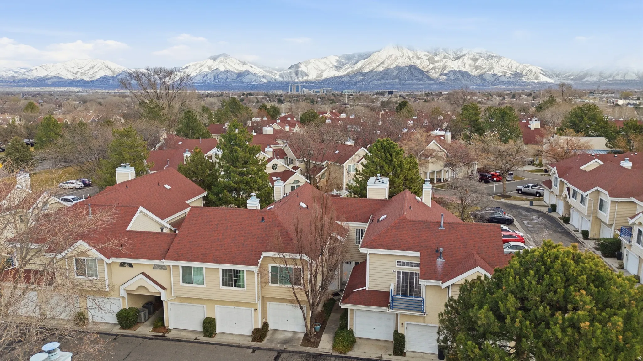Aerial view of residential area with mountains