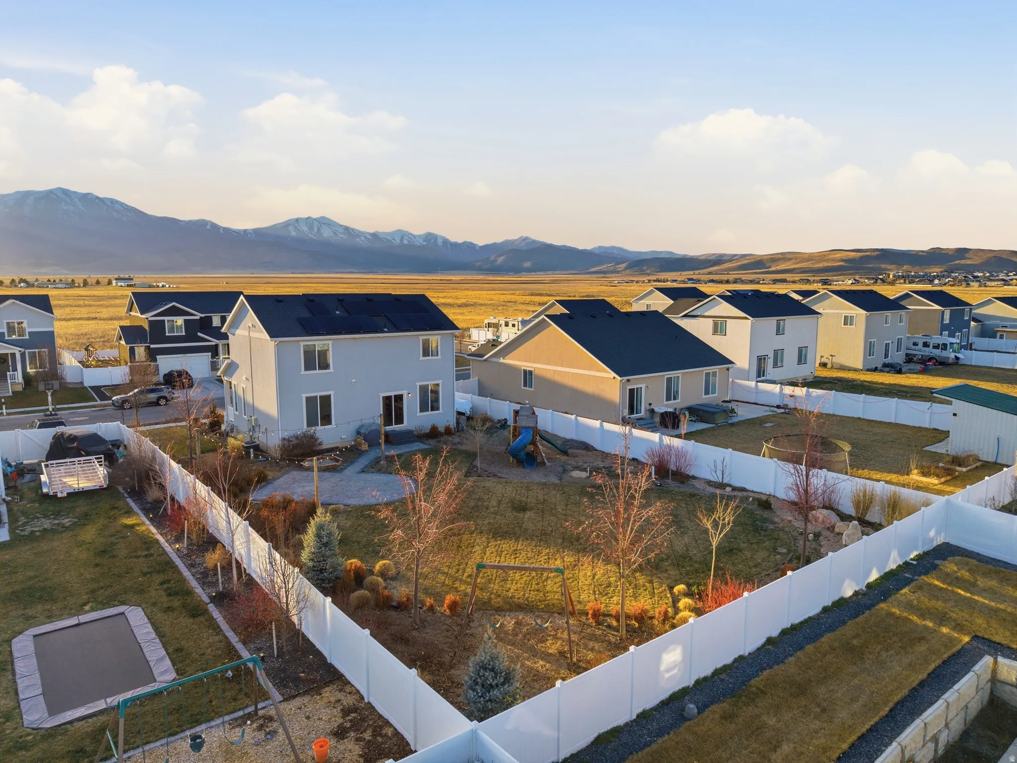Aerial perspective of suburban area featuring mountains