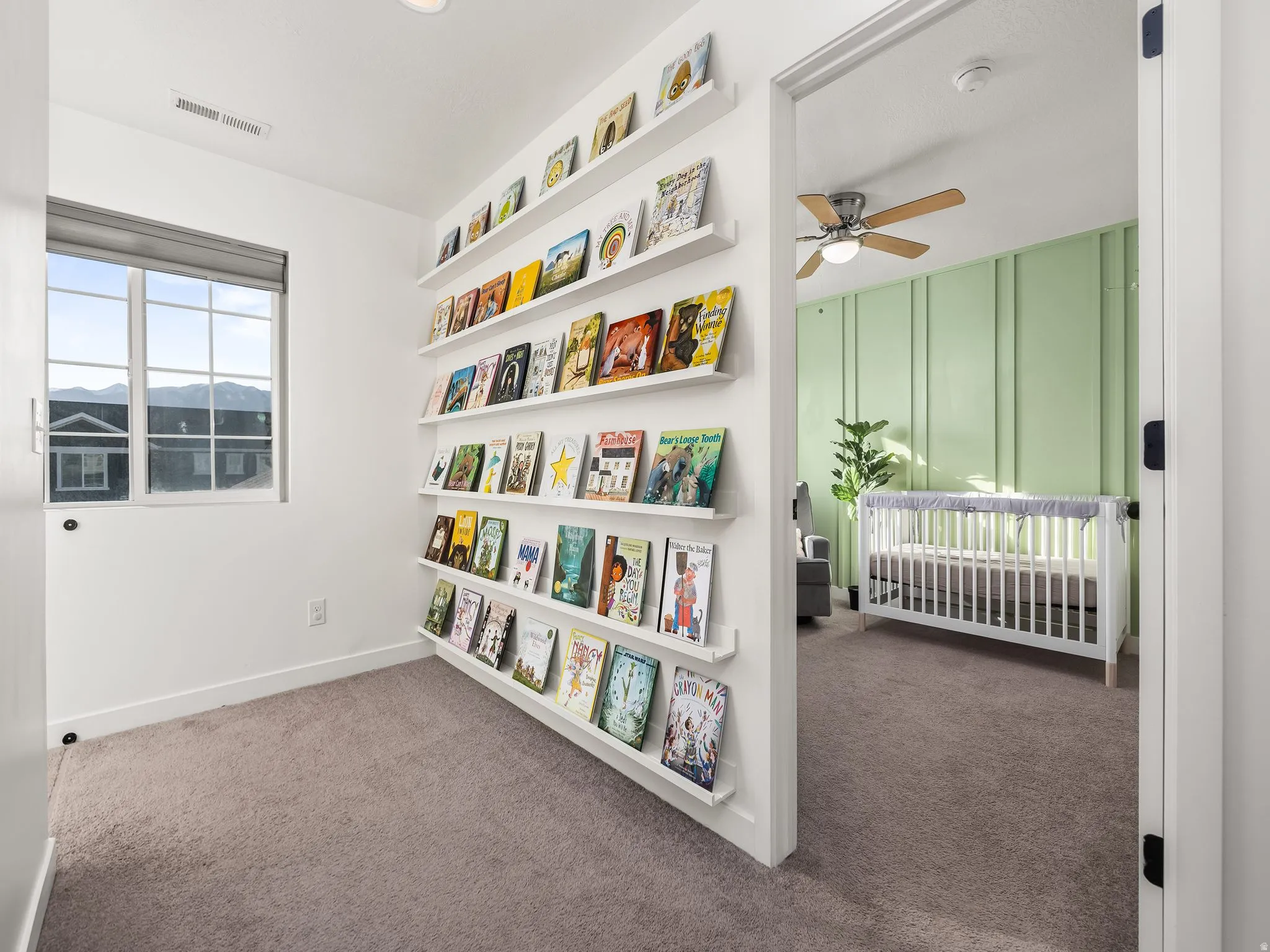 Bedroom featuring dark colored carpet