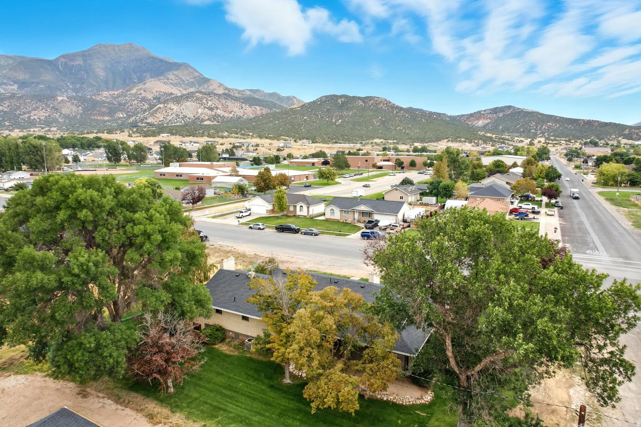 Aerial view of residential area with a mountainous background