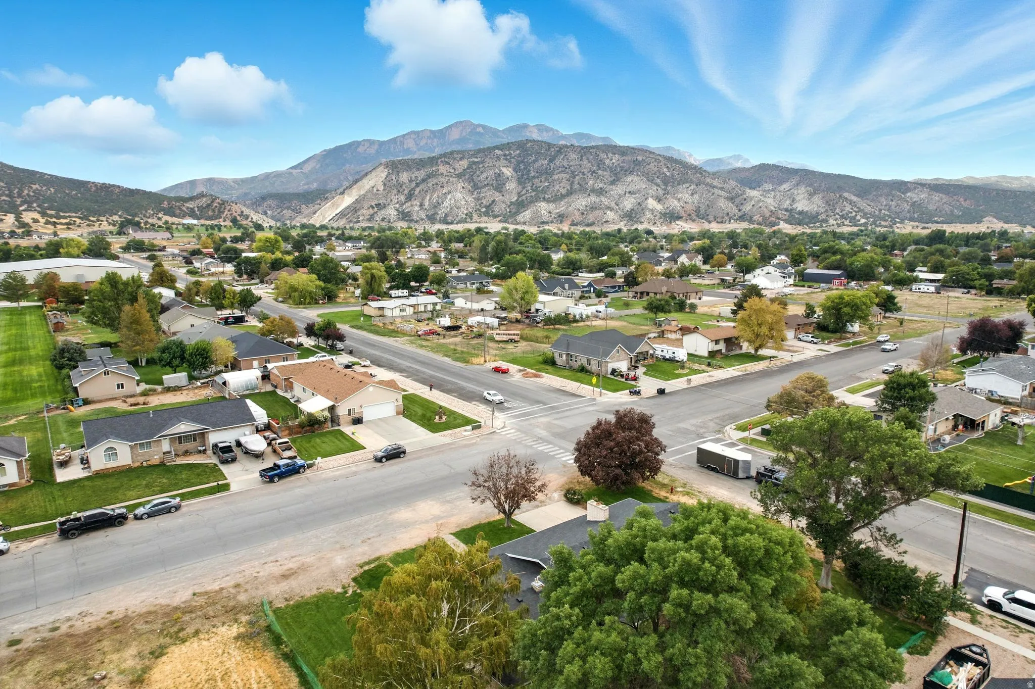 Aerial perspective of suburban area featuring mountains