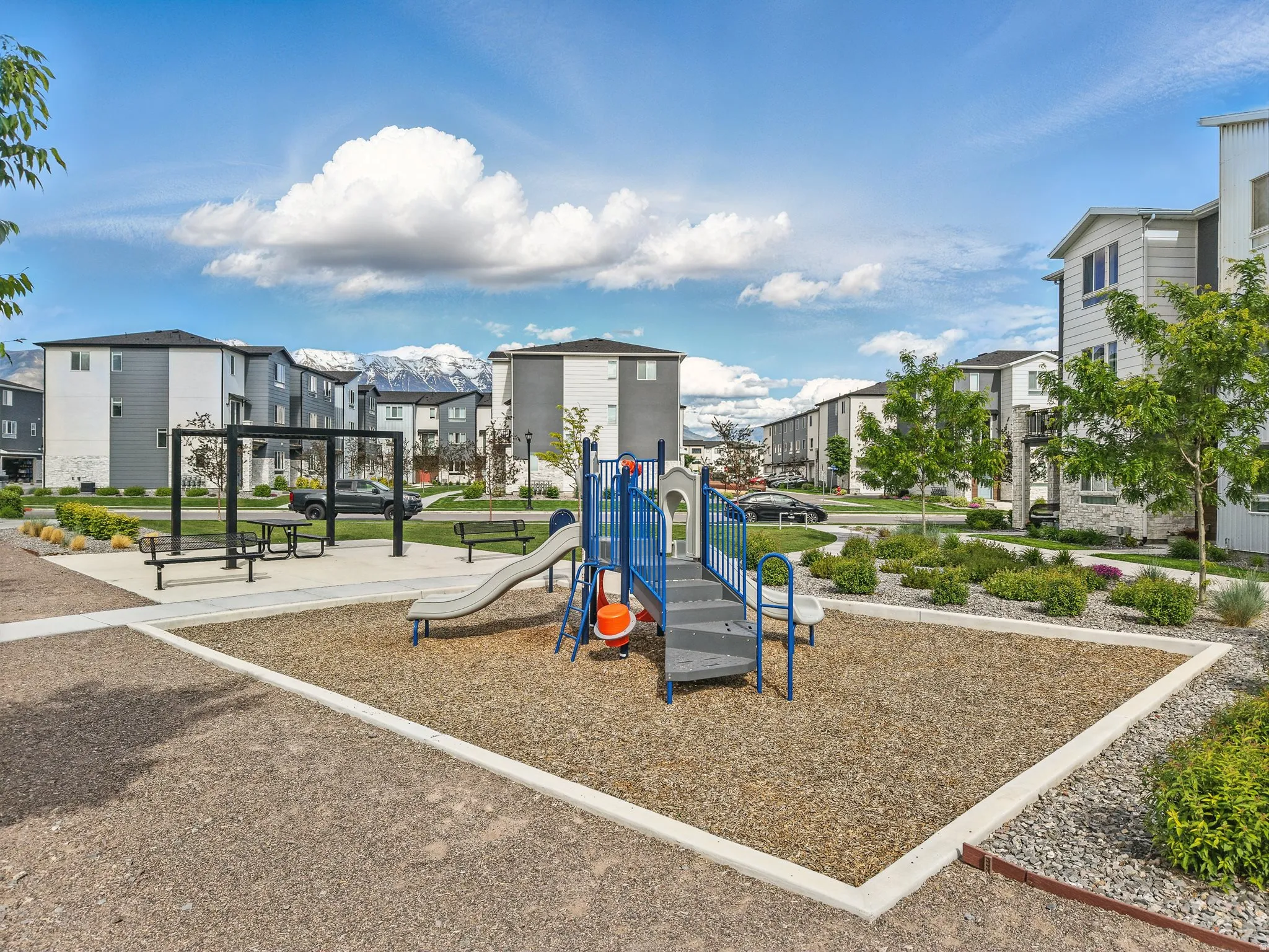 Communal playground with a residential view