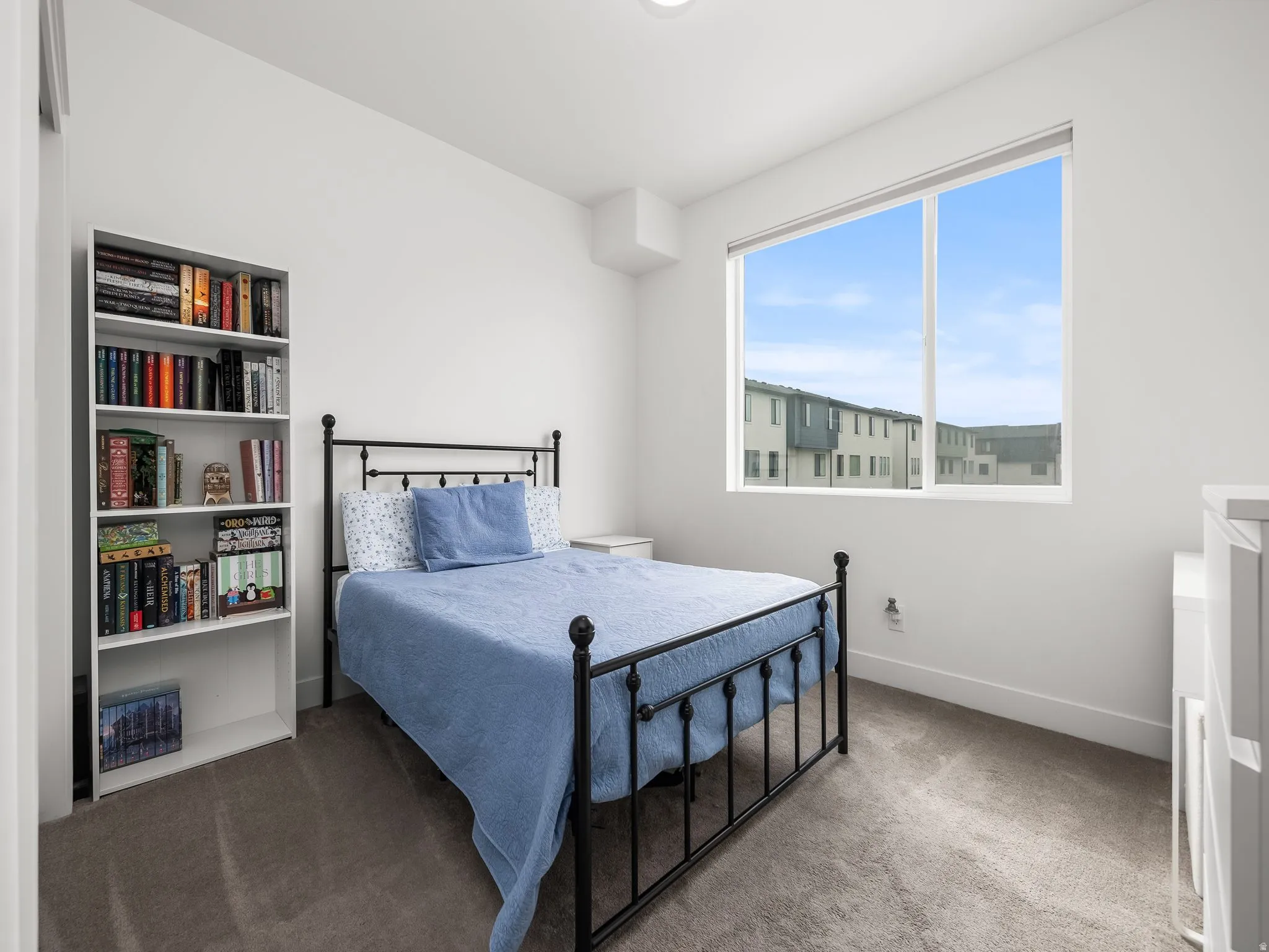 Bedroom with carpet flooring