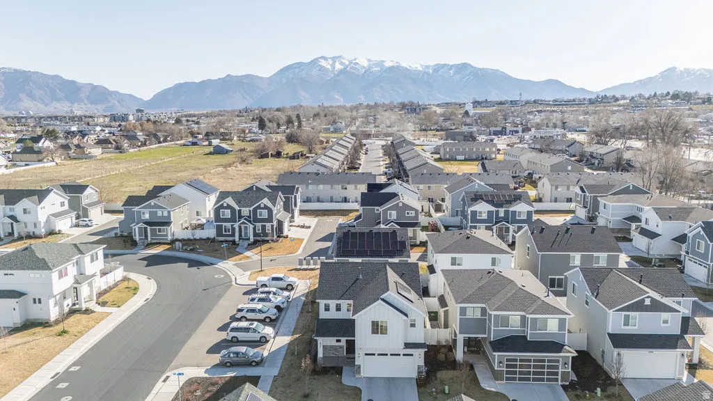 Aerial view of residential area with mountains